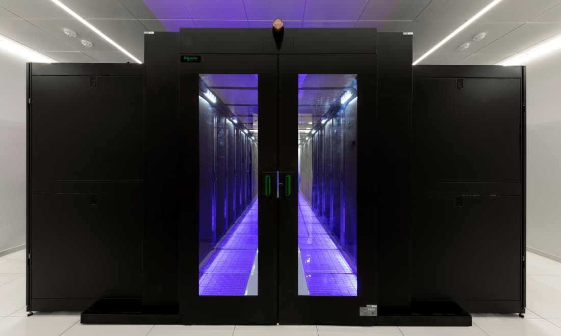 Schneider Electric cold-aisle containment doors in the WaveCom server room